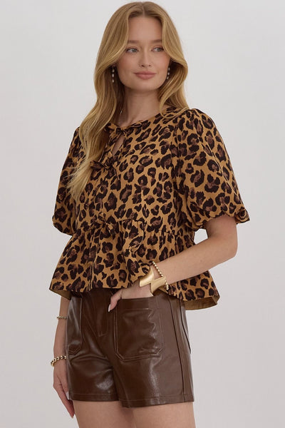 the Hezly Bow tie animal print peplum top