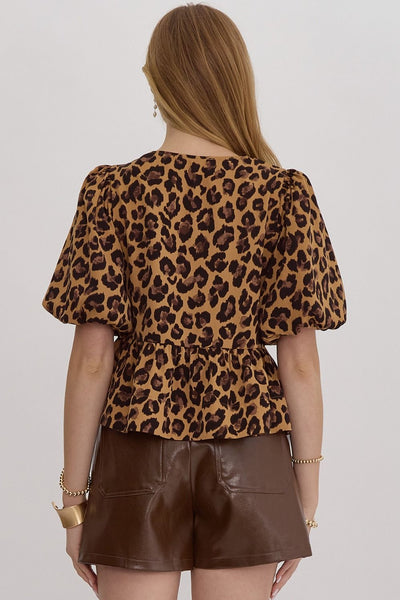 the Hezly Bow tie animal print peplum top